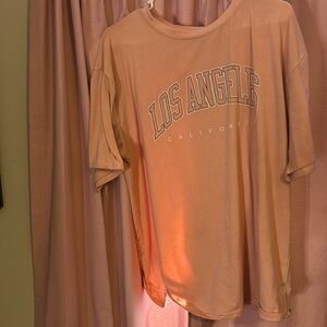 super cute shirt can’t fit in no more size L no stains only been worn twice !!